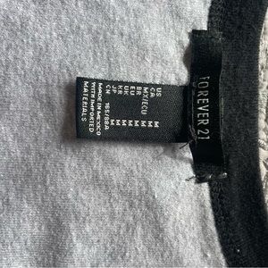 Black and gray short round neck blouse